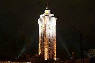 Aufzugs- und Uhrturm der ehemaligen Schubert & Salzer AG in Chemnitz, 2015 von Sandro Schmalfuß (Eigenes Werk) [CC BY-SA 4.0 (http://creativecommons.org/licenses/by-sa/4.0)], via Wikimedia Commons